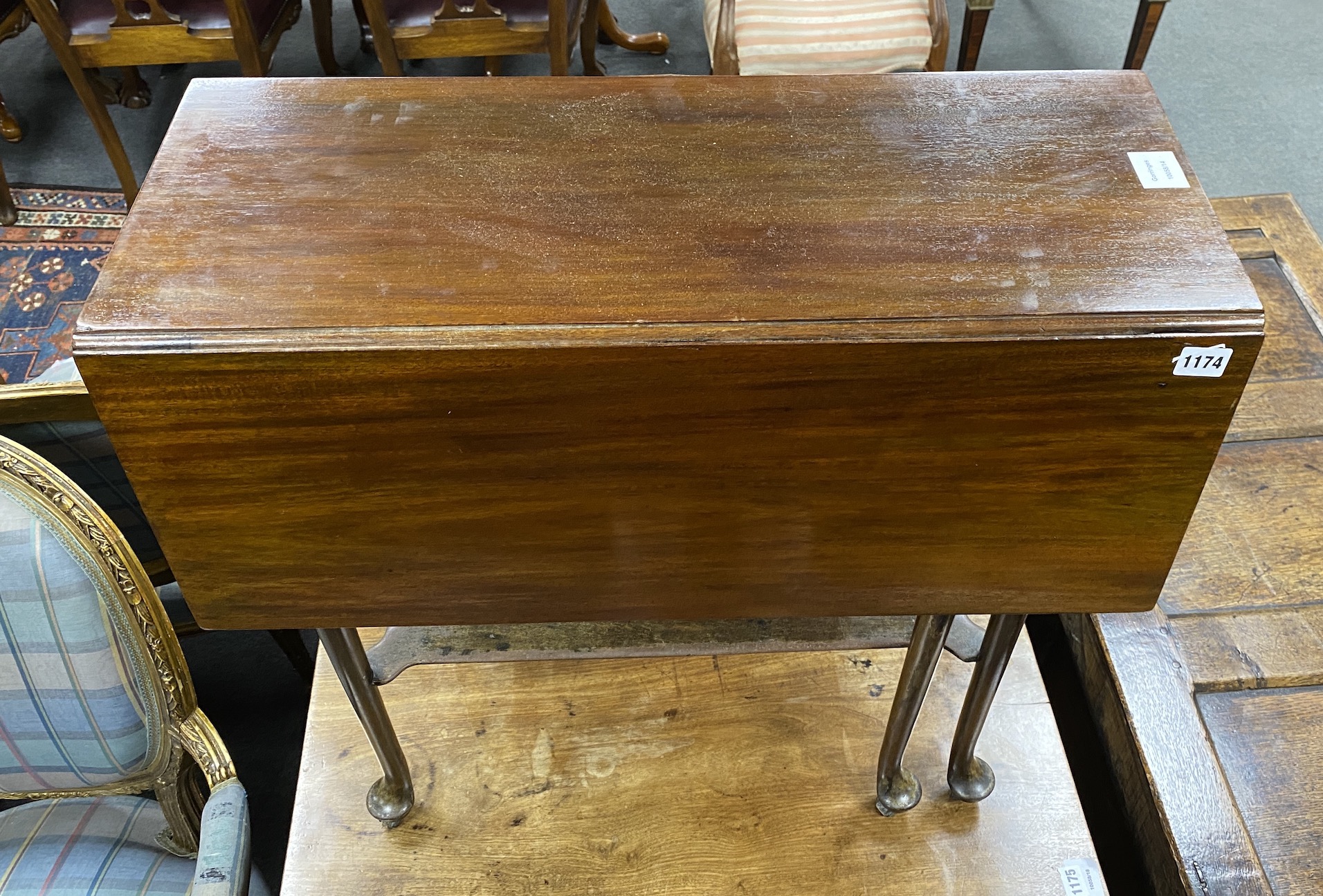 A George III mahogany pad foot drop leaf two tier tea table, width 71cm, depth 82cm extended, height 69cm